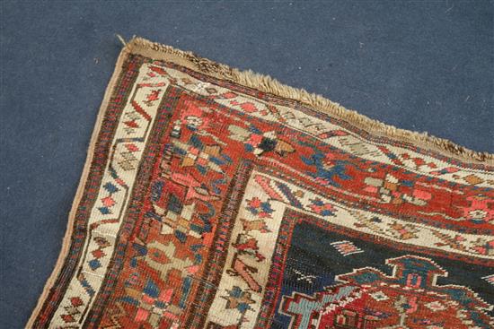 A Kazak blue ground runner, c.1880, 11ft 8in by 3ft 8in.